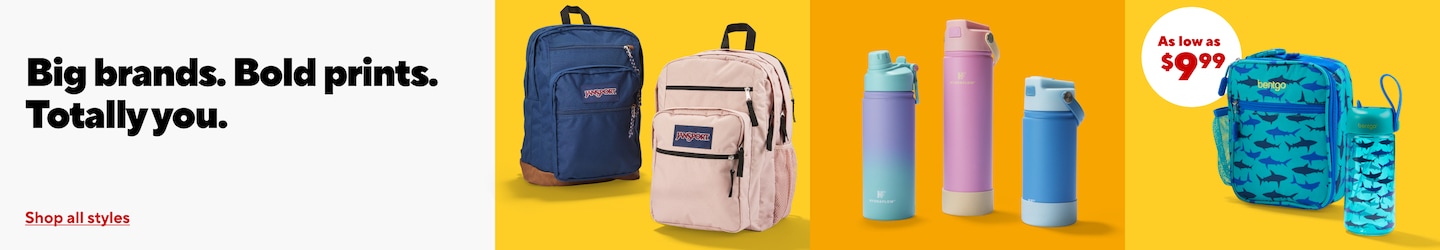 Big brands. Bold prints. Totally you. Loud, laid-back or low-key – we’ve got a backpack (and lunch bag for that). Shop by style. Image of shark patterned lunch box and water bottle, jansport backpack with school supplies and 3 different sized color water bottles.